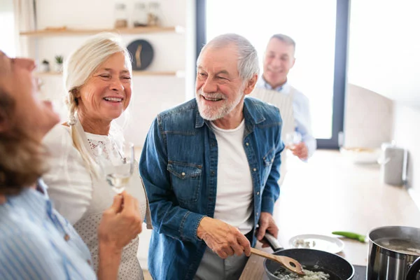 group-of-older-friends-in-the-kitchen