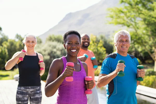 happy-group-of-adults-ruining-with-dumbbells